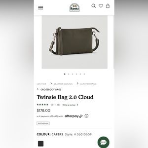 New with dust bag- Roots Twinsie style cross body bag